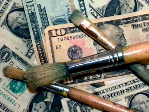 money and art brush