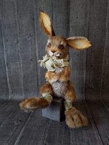 handmade toy stylish rabbit in teddy style